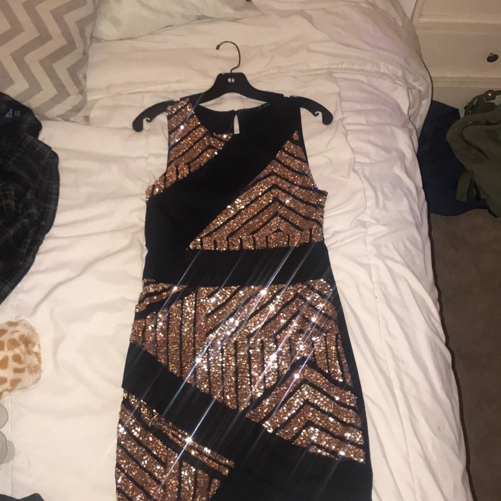 Mini black dress with rose gold sequins